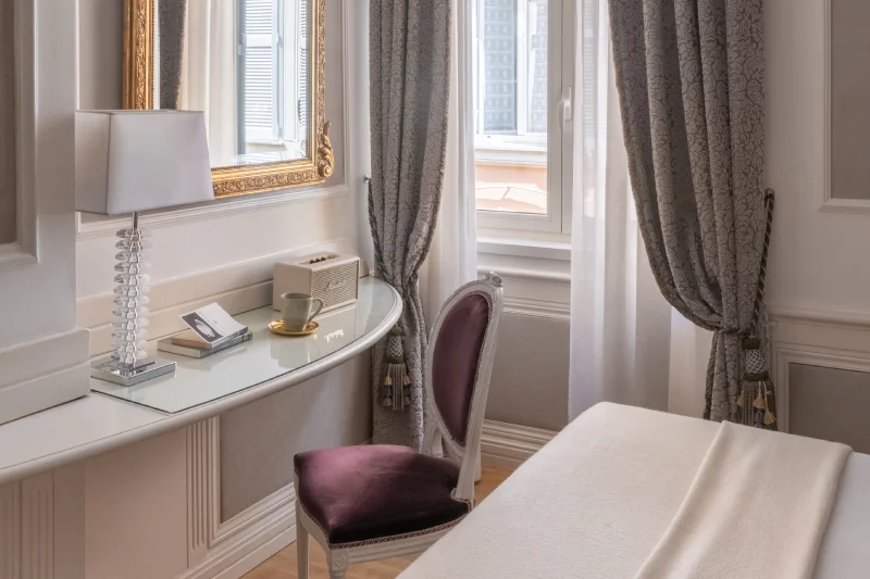 Deluxe writing desk with gilded mirror, lamp and window, ideal for business stays in Rome - The Hotel Britannia, BZAR hotels in Rome
